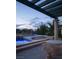 Outdoor living area features a pool and spa, perfect for relaxing evenings with friends and Gathering at 1413 Iron Hills Ln, Las Vegas, NV 89134