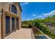 Outdoor balcony with beautiful views, mature landscaping and a private pool at 1701 Tesara Vista Pl, Las Vegas, NV 89128