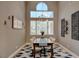 Elegant dining room with stylish lighting, refined decor, and comfortable seating at 1701 Tesara Vista Pl, Las Vegas, NV 89128