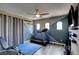 Spacious exercise room with motivational decor, exercise machine and mounted TV at 1701 Tesara Vista Pl, Las Vegas, NV 89128