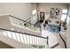 Foyer featuring staircase, view of the entryway and formal living room at 1701 Tesara Vista Pl, Las Vegas, NV 89128