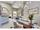 Open-concept living space with stylish dining area, perfect for entertaining guests at 1701 Tesara Vista Pl, Las Vegas, NV 89128