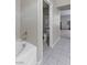A bright bathroom includes a tub and access to the toilet at 176 Jay Porter Ave, Henderson, NV 89002