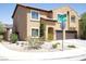 Charming home at the corner features well-kept landscaping and an attached two-car garage at 176 Jay Porter Ave, Henderson, NV 89002