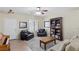 Charming living room featuring plush seating, built-in shelving, and natural light at 176 Jay Porter Ave, Henderson, NV 89002