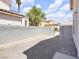 Private backyard area with gravel and block wall perfect for outdoor activities at 185 Renville Ct, Henderson, NV 89074
