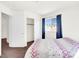 Comfortable bedroom with a closet, window, and neutral color scheme at 185 Renville Ct, Henderson, NV 89074
