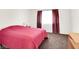 Cozy bedroom featuring a bed and ample lighting at 185 Renville Ct, Henderson, NV 89074