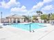 Community pool with lounge chairs and shade, perfect for relaxing and enjoying sunny days at 185 Renville Ct, Henderson, NV 89074