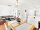 Cozy dining area with wood floors, adjacent to the living room and kitchen at 185 Renville Ct, Henderson, NV 89074