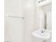 Compact powder room featuring a pedestal sink and modern fixtures at 185 Renville Ct, Henderson, NV 89074