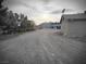 Expansive gravel yard, complemented by views of the surrounding landscape at 1930 N Murphy St, Pahrump, NV 89060