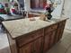 Spacious kitchen island features granite countertops and ample cabinet space at 1930 N Murphy St, Pahrump, NV 89060