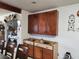 Wooden cabinets with drawers in kitchen at 1930 N Murphy St, Pahrump, NV 89060