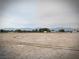 Wide open lot with surrounding mountains and beautiful sky at 1930 N Murphy St, Pahrump, NV 89060