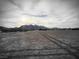 Wide open land featuring distant mountains, offering endless possibilities at 1930 N Murphy St, Pahrump, NV 89060