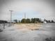 Vacant lot with trees and utility poles nearby at 1930 N Murphy St, Pahrump, NV 89060