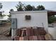 Exterior view of a shed with storage and equipment, providing practical space for projects and tools at 1930 N Murphy St, Pahrump, NV 89060