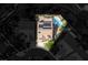 Aerial view showcases a home with a pristine pool, solar panels and beautiful landscaping in a Gathering-friendly community at 1978 Kachina Mountain Dr, Henderson, NV 89012