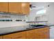 Modern kitchen counter with a sink and a tile backsplash at 1978 Kachina Mountain Dr, Henderson, NV 89012