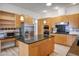 Kitchen with an island, stainless steel appliances, and ample cabinet space at 1978 Kachina Mountain Dr, Henderson, NV 89012
