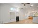 Bright, airy living room with a fireplace, wood floors, and modern fixtures at 1978 Kachina Mountain Dr, Henderson, NV 89012