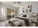 Stylishly decorated main bedroom featuring a sliding door to the outside and wood-look floors at 1978 Kachina Mountain Dr, Henderson, NV 89012