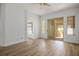 Spacious main bedroom features a sliding door to the outdoors, wood-look floors at 1978 Kachina Mountain Dr, Henderson, NV 89012