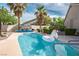 Backyard view of the pool with an inflatable unicorn at 1978 Kachina Mountain Dr, Henderson, NV 89012