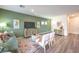 Cozy living room with modern furniture, wood floors, and stylish decor at 220 Biscotti Ave # Lot 127, North Las Vegas, NV 89084