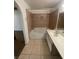 The bathroom features a large vanity and a shower and bath combo with tiled walls at 2200 S Fort Apache Rd # 2113, Las Vegas, NV 89117