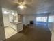 Open floor plan combines living area and kitchen with neutral tones at 2200 S Fort Apache Rd # 2113, Las Vegas, NV 89117