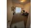 Simple bedroom featuring a window, desk, and white office chair at 2208 Dale Bumpers Ct, North Las Vegas, NV 89081