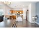 Eat-in kitchen featuring light wood cabinets, stainless steel appliances, and a center island at 2208 Dale Bumpers Ct, North Las Vegas, NV 89081