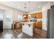 Bright and airy kitchen features a center island and stainless steel appliances at 2208 Dale Bumpers Ct, North Las Vegas, NV 89081
