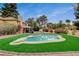Backyard with a private pool, landscaped yard, and plenty of space for activities at 2224 Lucerne Ct, Henderson, NV 89014