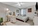 Cozy bedroom features a vanity, ceiling fan, and natural light at 2224 Lucerne Ct, Henderson, NV 89014
