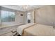 Well-lit bedroom with large window providing natural light and outdoor views at 2224 Lucerne Ct, Henderson, NV 89014
