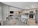 Open kitchen with stainless steel appliances, breakfast bar, and seamless flow to the living area at 2224 Lucerne Ct, Henderson, NV 89014