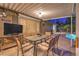 Outdoor patio area with a dining table and pool at 2231 Marlboro Dr, Henderson, NV 89014