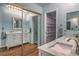 Bathroom featuring a double vanity with marble countertop and modern fixtures at 2231 Marlboro Dr, Henderson, NV 89014