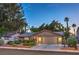 Inviting single-story home with a well-manicured lawn, mature trees, and great curb appeal, perfect for any Gathering at 2231 Marlboro Dr, Henderson, NV 89014