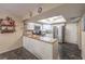 Bright kitchen with stainless steel appliances, granite countertops, and marbled flooring at 2231 Marlboro Dr, Henderson, NV 89014