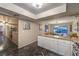 Spacious kitchen with granite countertops, stainless steel appliances, and open access to the dining room at 2231 Marlboro Dr, Henderson, NV 89014