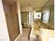 Bathroom featuring shower, tub, and mirrored closet doors at 2480 Domingo St, Las Vegas, NV 89121
