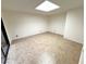 Bonus room featuring tile flooring and a skylight at 2480 Domingo St, Las Vegas, NV 89121