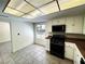 Eat in kitchen offers white cabinetry, stone countertops and stainless steel appliances at 2480 Domingo St, Las Vegas, NV 89121