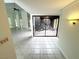 Open floor plan with high ceilings, tile floors, clerestory windows, and a unique atrium at 2480 Domingo St, Las Vegas, NV 89121