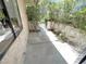 Enclosed patio area offering privacy with a brick wall and metal gate at 2480 Domingo St, Las Vegas, NV 89121