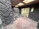 Unique stone patio with skylight and unique brick accent at 2480 Domingo St, Las Vegas, NV 89121
